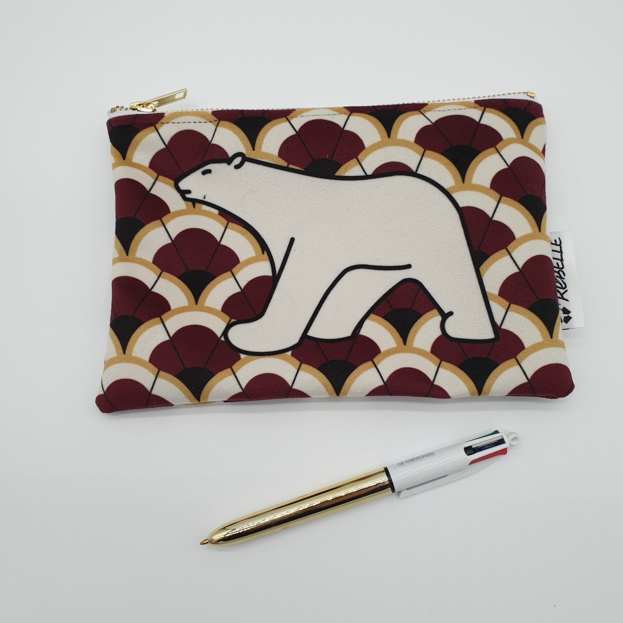 pochette velours ours pompon